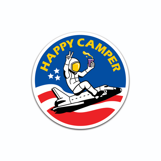 Image of astronaut riding rocket and holding purple cup with text "Happy Camper" on round sticker