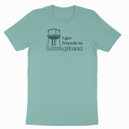 Image of water tower with text "I got friends in Lowe places" on light green t-shirt